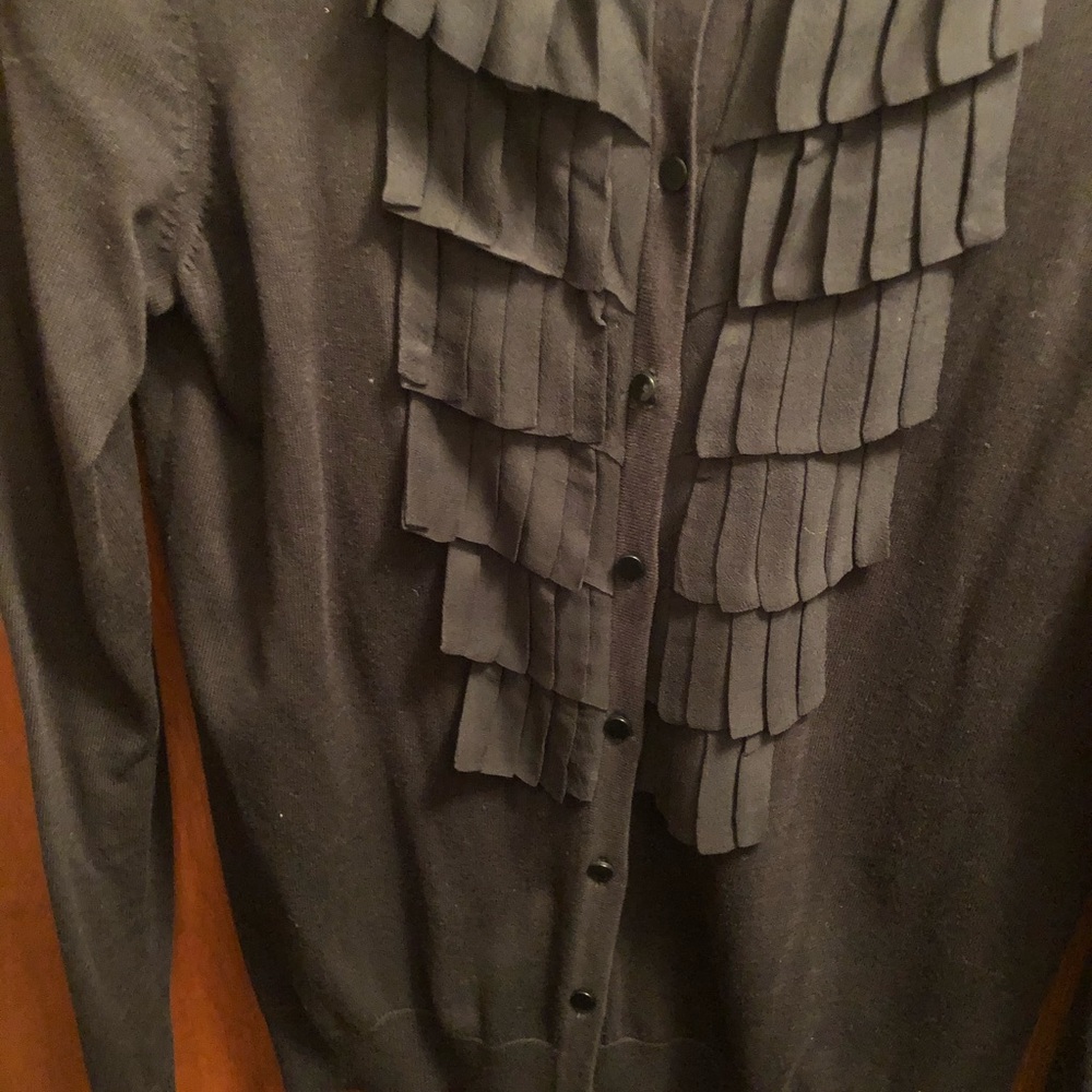 A brand new beautiful cardigan without tags